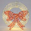 Décoration de Noël avec couronne lumineuse et nœud rouge avec minuterie