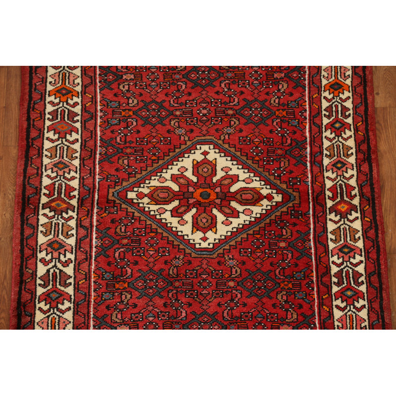 Tapis rouge à motif géométrique 3x5