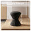 Repose-pieds rond en velours noir avec silhouette de tambour