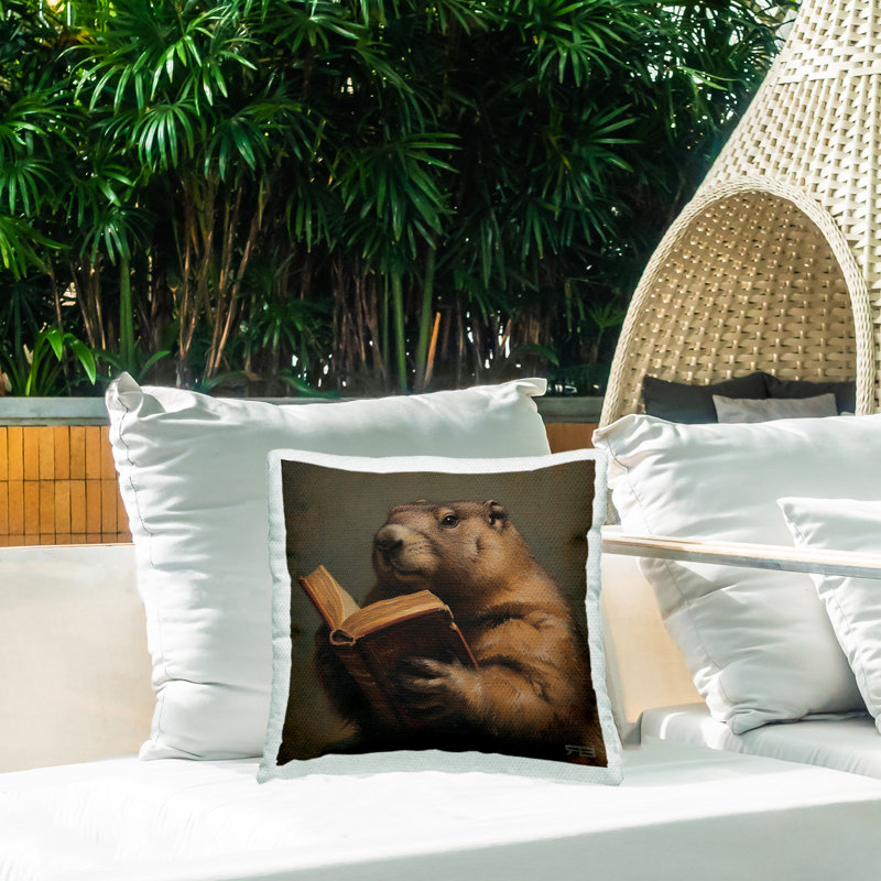 Coussin d'extérieur imprimé "Groundhog Reading Book" par Roozbeh Bahramali