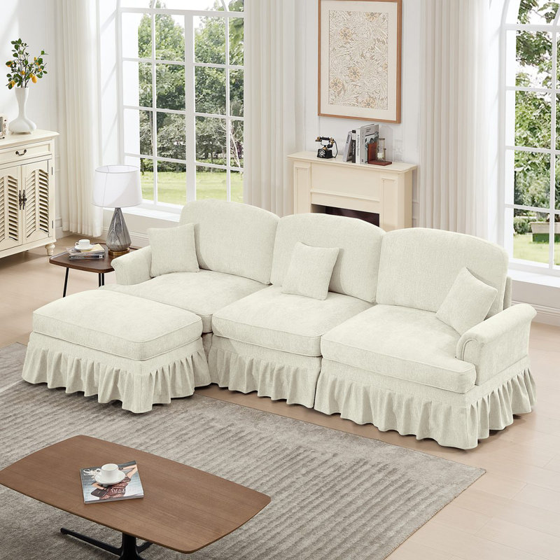 Canapé modulaire en forme de L à trois places Mid-Century avec accoudoirs évasés et volants amovibles, avec jupes plissées et pieds fuselés, canapé 3 places en chenille confortable avec repose-pieds mobile