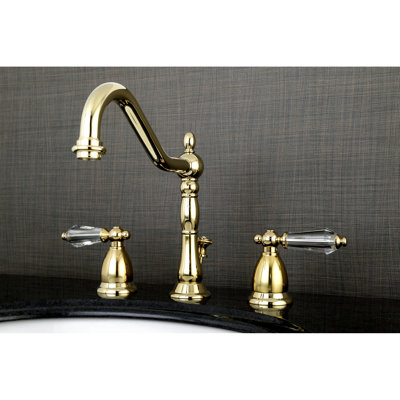 Kingston Brass Wilshire Two-Handle 3-Hole Deck Mount Widespread Bathroom Faucet with Brass Pop-Up Drain