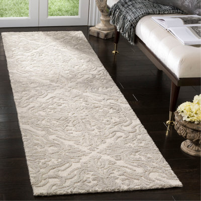 Ferrera Hand-Tufted Wool Ivory Area Rug