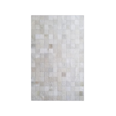 Tapis blanc en peau de vache à motif géométrique Charlie-Jo