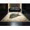 Tapis beige traditionnel lavable à la machine à motif de casque Viking Coalmont - Reliure beige