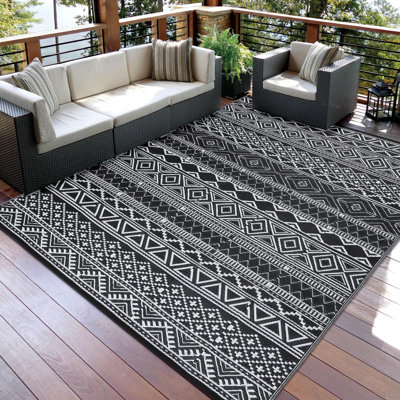 Tapis d'extérieur réversible 9 pi x 12 pi, tissage de paille en plastique imperméable, conception légère pliable, surface facile à nettoyer pour la cour, le patio, le camping et la plage
