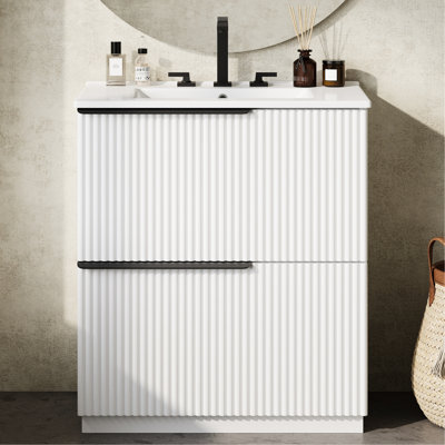 Meuble-lavabo de 30 po de couleur blanche, tiroirs d'extension et conception cannelée avec glissières à fermeture en douceur, trous de robinet de 8 po, finition brillante