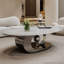 Table basse en marbre avec base sculpturale en acier inoxydable-90898032