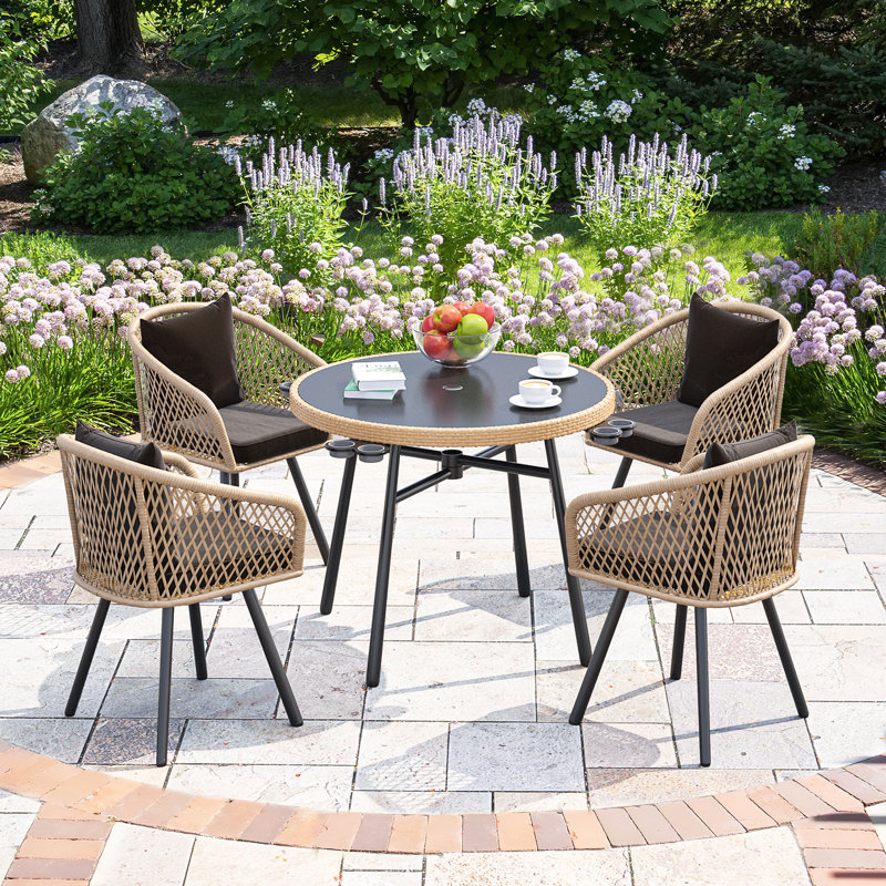 Lavette 4 - Person Patio Dining Set with Round Table , Cushions Included, Black
