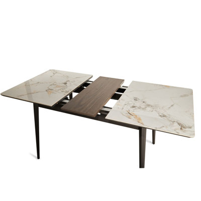 The rock plate can be extended to form a dining table for 6 to 8 people, a kitchen and a living room. It can be quickly assembled. The materials are rock plate and metal base