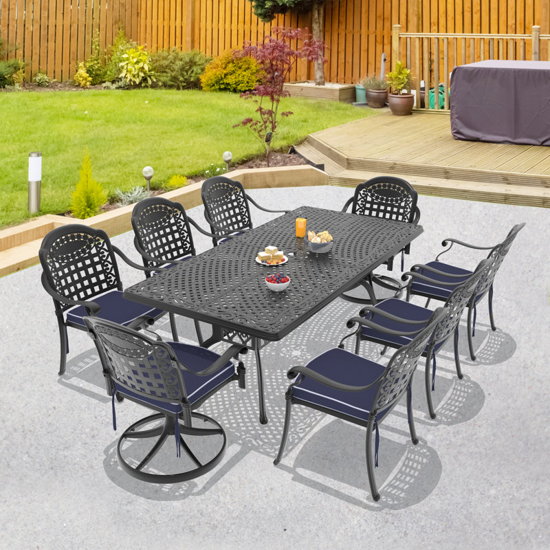 Ensemble de salle à manger rectangulaire pour 8 personnes en aluminium coulé avec 2 chaises pivotantes, coussins et trou pour parasol