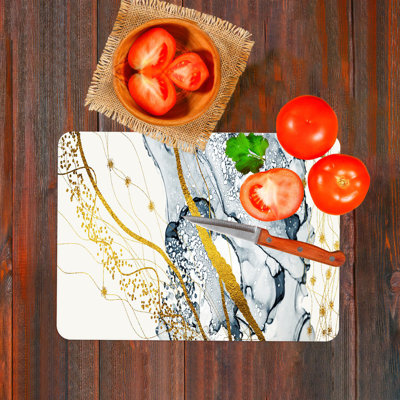 Planche à découper en verre doré et gris à motif de marbre pour une cuisine moderne