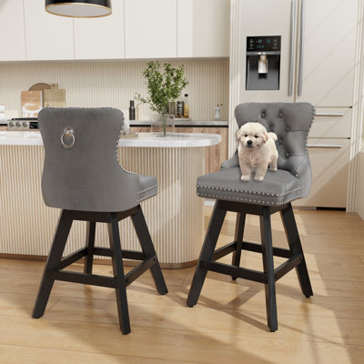 Ensemble de 2 tabourets de bar en bois touffeté et pivotant en velours