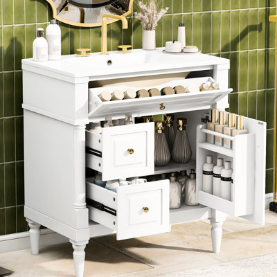 Meuble-lavabo autoportant de 76 cm (30 pouces) blanc, structure et panneaux en bois d'hévéa massif, lavabo en céramique, tiroirs à fermeture douce et tablette réglable pour un rangement fiable et facile à utiliser.