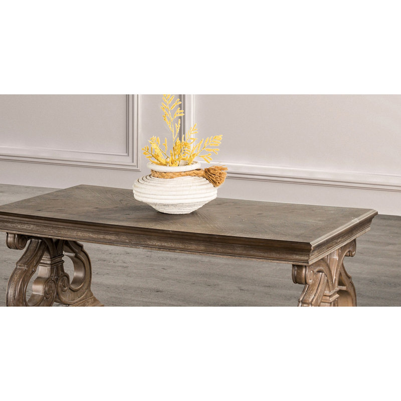 Table basse au design traditionnel avec détails, pieds à volutes, plateau de taille moyenne, finition en chêne massif patiné et placage, largeur de 28 po, poids de 60 lb