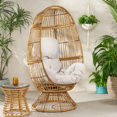Fauteuil œuf d'extérieur avec coussin - Marron. Confort de style de panier. Durable. Rembourrage imperméable. 79 cm (l) x 70 cm (p) x 151 cm (h). Détails faits à la main. Assemblage requis. Conception tressé. Assise. Nécessaire.
