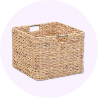Natural woven water hyacinth storage basket with metal handles