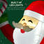 Père Noël souriant avec canne en bonbon gonflable