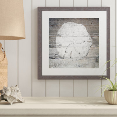 Avika 'Sand Dollar' Framed Graphic Art Print