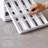 YouCopia SpiceStack® Adjustable Spice Rack Organizer, Pull-Down 24-Bottle Seasonings and Spices Holder for Kitchen Cabinet and Pantry Organization with 104 Included Labels, Organizing Hero Collection
