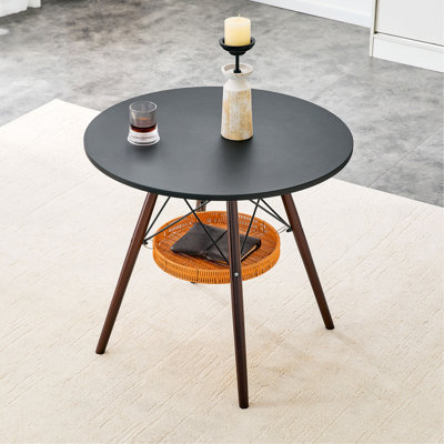 31.5-inch diameter circular dining table, MDF vacuum formed tabletop, solid wood legs, with suspended woven storage basket structure. A casual coffee table suitable for 2-4 people.