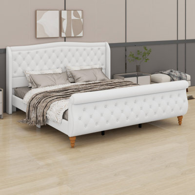 Cadre de lit avec tête de lit à oreilles enveloppée et pied de lit traîneau pour une élégance intemporelle dans la chambre à coucher