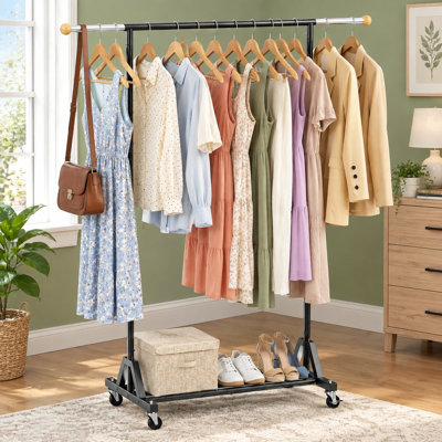 Pour le placard, la buanderie ou la chambre à coucher: Organisateur de vêtements mobile autoportant avec tringles de suspension rétractables, roues verrouillables et tablette de rangement inférieure pour manteaux et vêtements