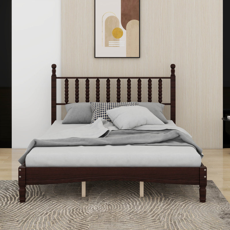 Grand lit plateforme en bois avec tête de lit en forme de gourde
