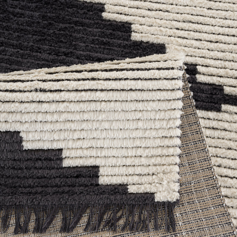 Allie Black & Ivory Synthetic 5' x 7' Easy-Care Area Rug