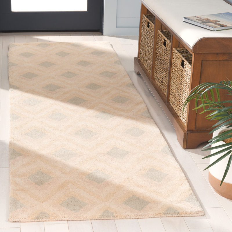 Tapis beige touffeté à la main