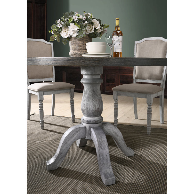 Iris Round Pedestal Wood Dining Table