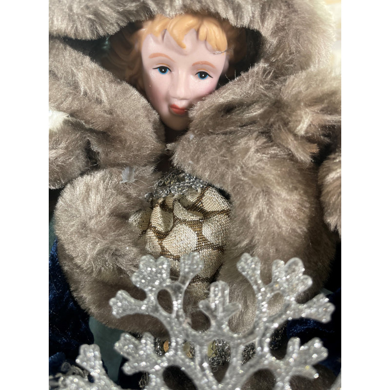 Ange bleu d'hiver avec flocon de neige