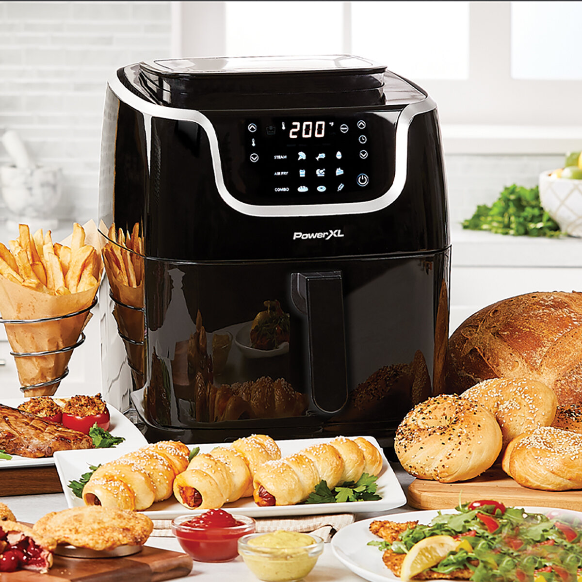 Air fryer outlet steamer