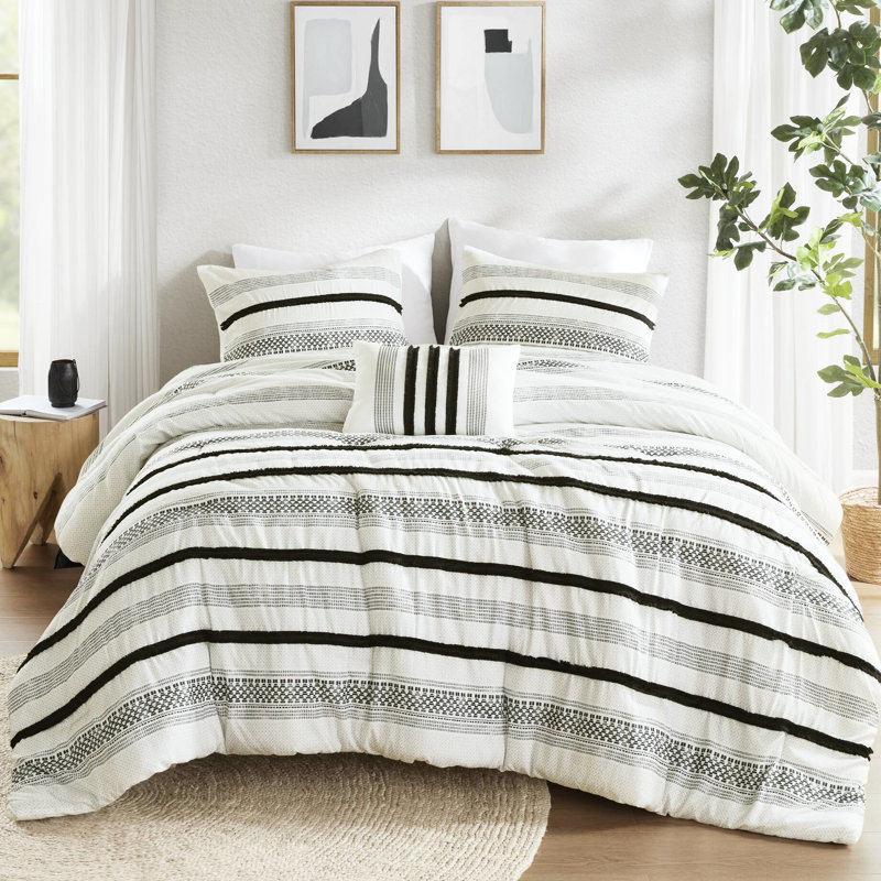 King/ King 7 Piece Comforter And Quilt . Crafted From Microfiber. Provides Outstanding Comfort. Soft Fluffy. Stripe Pattern. Adapts To Different Bedroom Decor. Wrinkle Shrinkage . Easy Upkeep - King.