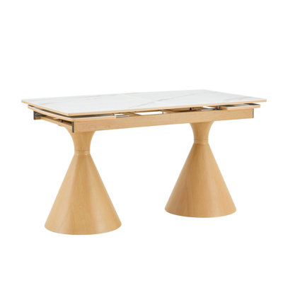 Extendable Stone-Top Dining Table: White marble-patterned tabletop with wood-colored tapered metal legs. A modern, luxury-inspired rectangular dining