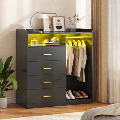 Wrought Studioâ„¢ Black Dresser for Bedroom with Hanging Rack Dresser for Closet,4 Drawer Dresser with LED Lights & Charging Station, All Wooden Dresser