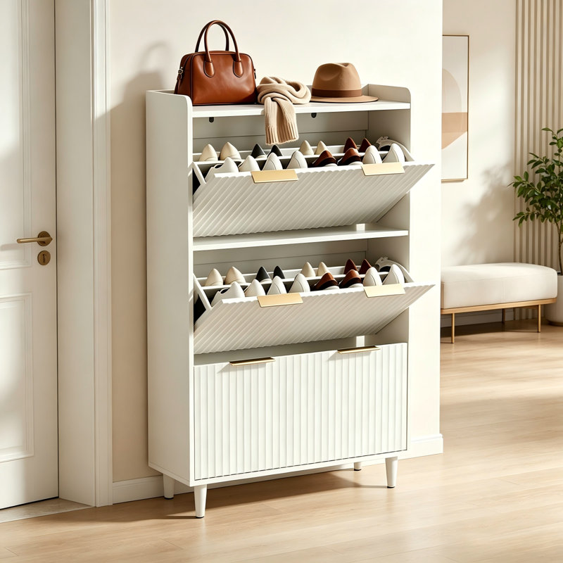 Armoire à chaussures 3 tiroirs avec grille supérieure, panneaux de porte en panneau de fibres à densité moyenne thermoformés, coutures et poignées de porte dorées champagne, pieds en bois massif conique