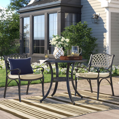 Coddington 2 - Person Patio Dining Set Umbrella Hole Included Round Table with Cushions Included