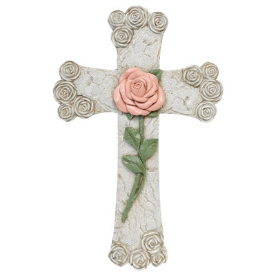 Croix murale suspendue rose à motif floral rose