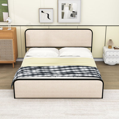 Lit plateforme luxueux en métal avec tête de lit tapissier