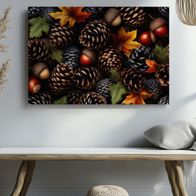 Toile dans un tableau d'automne richement texturé, arrangement dense d'art mural, pommes de pin brillantes aux nuances variées de brun foncé