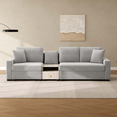 Canapé modulaire rembourré 3 places avec accoudoirs et console centrale pour le salon