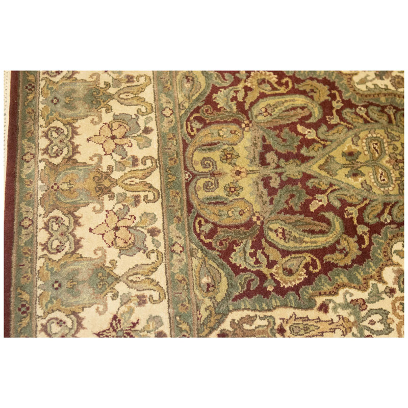 Hand Knotted Wool Oriental Area Rug in Green And Cream