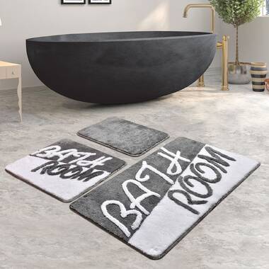 https://assets.wfcdn.com/im/75164305/resize-h380-w380%5Ecompr-r70/1257/125718419/100%25+Acrylic+Bath+Rug+with+Non-Slip+Backing.jpg