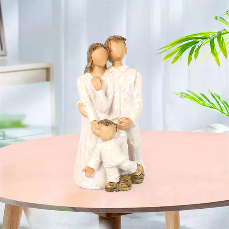 Mère père enfant famille sculptée