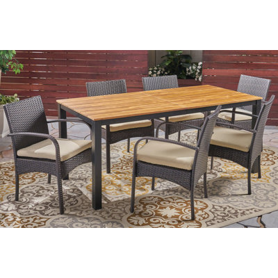 Hallsburg 6 - Person Acacia Solid Wood Patio Dining Set Rectangular Table with Cushions Included