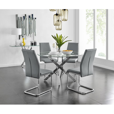 Tierra Sleek Metal and Glass Round Dining Table Set with 6 Faux Leather Upholstered Dining Chairs
