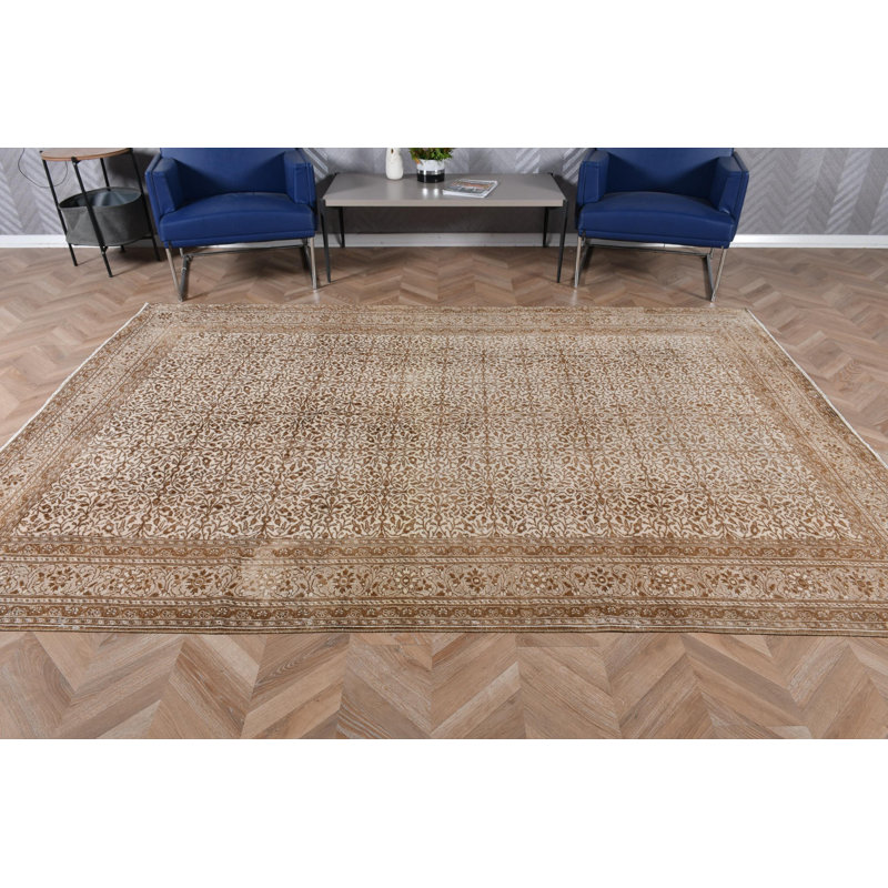 Authentique tapis turc vintage en laine, idéal pour un usage au salon, conçu dans un style traditionnel anatolien dans des tons de brun chaud