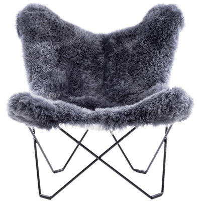 Fauteuil papillon en peau de mouton