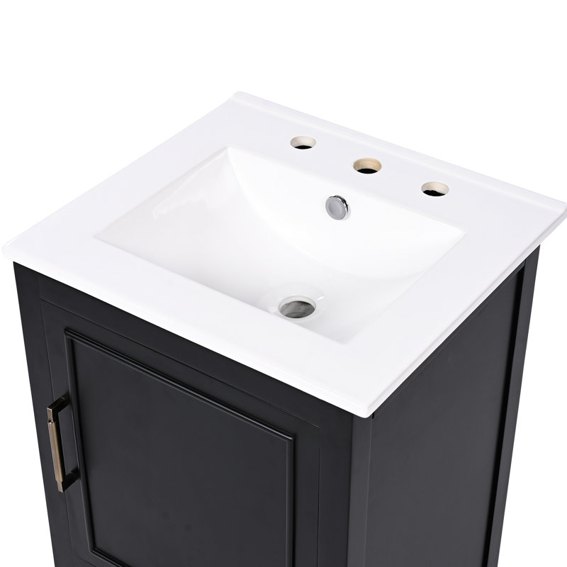 Meuble-lavabo noir 20 po - Construction, lavabo en céramique, tablette de porte, tiroir, charnières rouillées, largeur du meuble de 17,1 po, matériaux de la porte, rangement du tiroir, surface, emplacement central, profondeur du dessus de 6,7 po